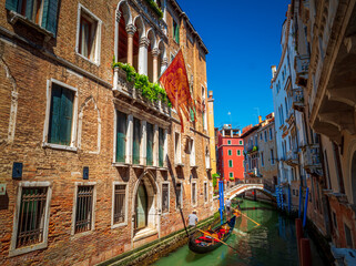 Obraz na płótnie Canvas Venice tight water streets with popular gondola transportation