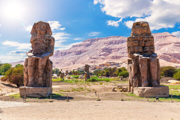 The Colossi of Memnon, famous statues of the Pharaoh Amenhotep, Luxor, Egypt