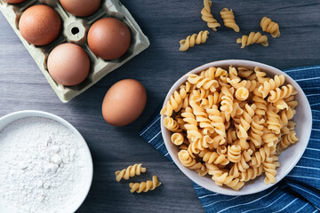 spiral pasta dish with eggs and flour