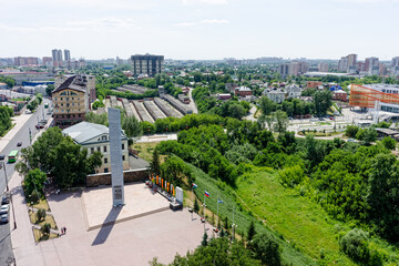 Stella with eternal flame and museum building