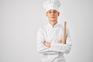 chef with a white cap on his head kitchenware cooking