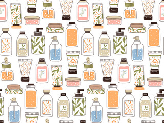 Seamless repeating pattern with cosmetics. A set of bottles and tubes, jars for skin care with face, hair and body cream. Fashion style for a postcard, banner, template for wrapping paper. Vector.