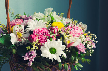 a beautiful bouquet of flowers in a basket