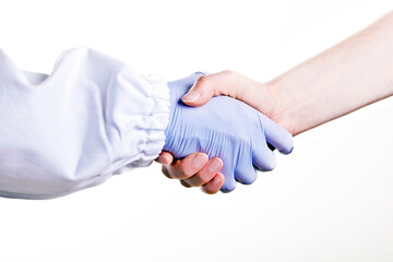 handshake between two people, doctor and patient