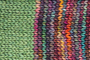 texture of hand-knitted woolen fabric close up