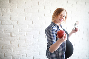 Pregnant young beautiful girl on the ninth month