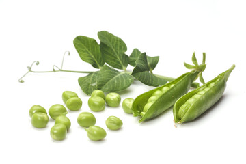 Pods of green peas with leaves isolated on white background