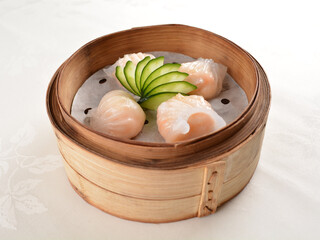 steamed fresh prawn meat seafood crystal dumpling ball har gao in bamboo basket Hong Kong dim sum menu