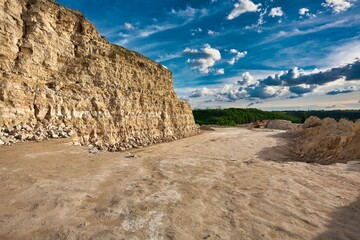 Landscape of stone quarry on a summer day. - obrazy, fototapety, plakaty