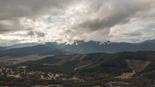 Aerial hyperlapse of moutain with moving cloudy sky at Falls Creek in VIC, Australia