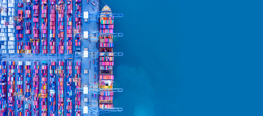 Top view of International Container ship loading and unloading at sea port, Freight Transportation,...