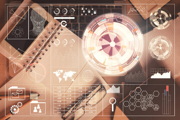 Double exposure of technology theme drawing over work table desktop. Top view. Global data analysis concept.