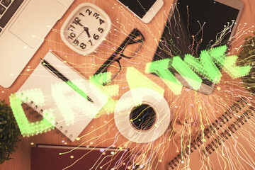 Multi exposure of creative drawing over table with phone. Top view. Concept of startup.