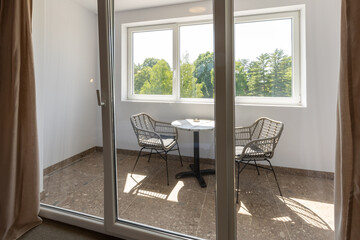 Glazed smoking area interior in modern apartment