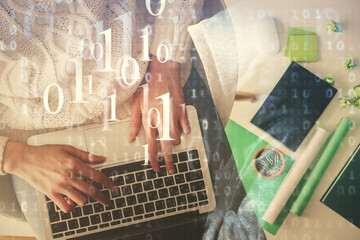 Double exposure of woman hands working on computer and data theme hologram drawing. Top View....