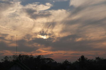 Orange and blue clouds unite in the afternoon