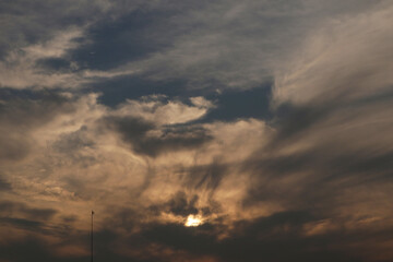 Orange and blue clouds unite in the afternoon