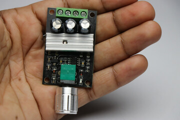 Top view of DC motor speed regulator board which use pulse width modulation - obrazy, fototapety, plakaty