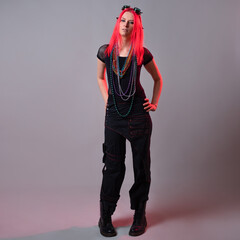 Kitsch style, fashion of the future. mixing styles. A young woman