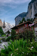 Lauterbrunnen Church with Staubbachfall Waterfall - Small Village - Jungfrau Region in Summer -...