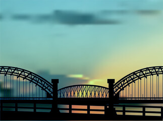 large black bridge at late sunset