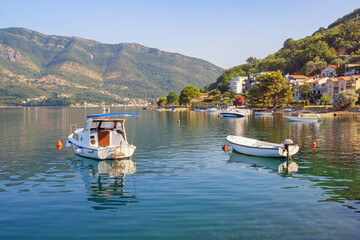 Beautiful Mediterranean landscape on sunny summer day. Montenegro, Adriatic Sea. View of  Bay of Kotor near Tivat city, Donja Lastva village