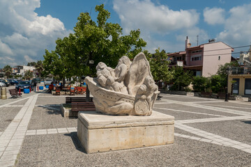 Greece, Nea Skioni, statue on the fishing port
