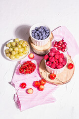 Fresh raspberries, blueberries, grape, sweet cherries, and red currants