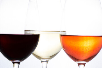 red wine pouring into glass