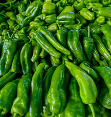 Obraz na płótnie Canvas Fresh green peppers on the market