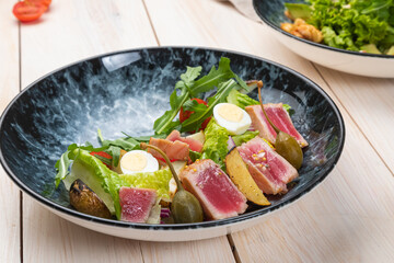 fresh summer light salad with tuna and arugula