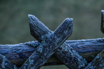 frosted wooden fence with blurred background 