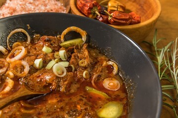 Traditional Hungarian beef stew stew. Goulash with onion and garlic. Spicy food.