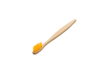 Bamboo toothbrush isolated on a white background.