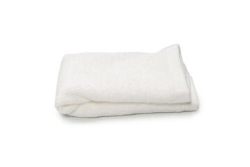 White fluffy cotton towel isolated on a white background.