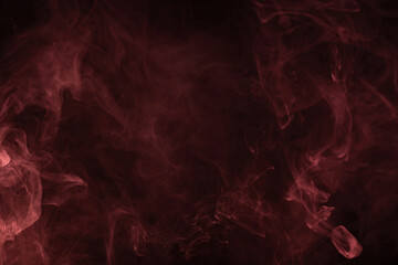 Yellow and pink steam on a black background.