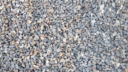 Crushed gravel. Stone texture. Gray gravel. Background.