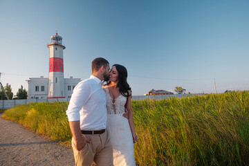bride and groom. Luxurious young couple of newlyweds in love posing for the first family wedding photo shoot
