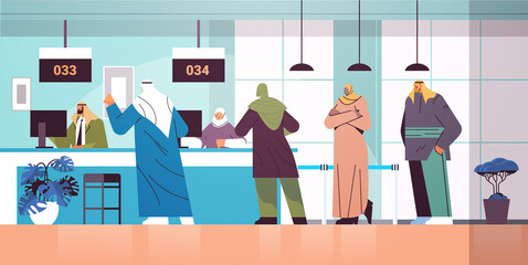 arab people looking at display number board in waiting room electronic queuing system queue management