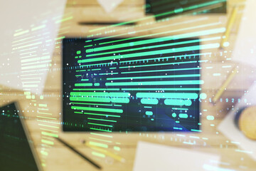 Abstract creative world map and modern digital tablet on background, top view, international trading concept. Multiexposure