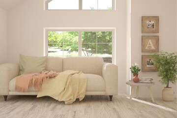 White living room with sofa and summer landscape in window. Scandinavian interior design. 3D illustration