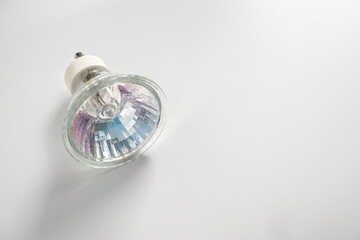 halogen lamp with pin base, energy, light, energy saving, white background, empty space for text