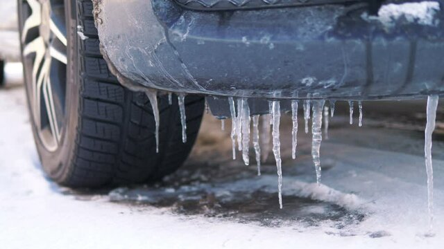 Icicles on the car chassis in 4k slow motion 60fps