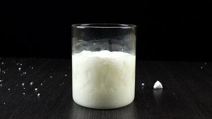 slime made using styrofoam in a glass jar. Styrofoam recycling concept