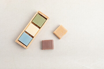 Handmade natural bar soaps. Ethical, sustainable zero waste lifestyle. DIY, hobby, artisan small business idea. Top view, mockup