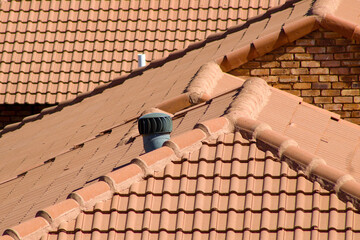 View of red-tiled roofs on a sunny day