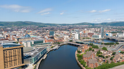 Aerial view on river and buildings in City center of Belfast Northern Ireland. Drone photo, high angle view of town - obrazy, fototapety, plakaty