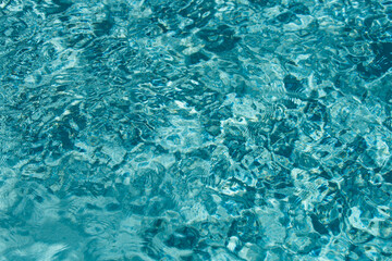 Background of water, surface blue swimming pool.