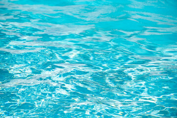 Water in swimming pool, background with high resolution. Wave abstract or rippled water texture.