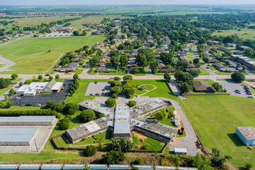 Fototapeta na wymiar Aerial view of residential district at suburban development with a american town Clinton Oklahoma USA